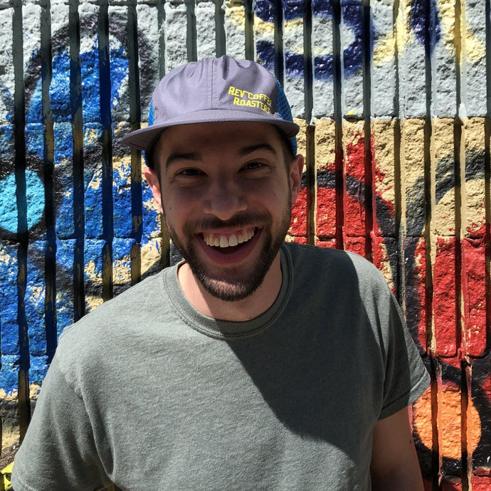 Charcoal and cyan running cap with logo